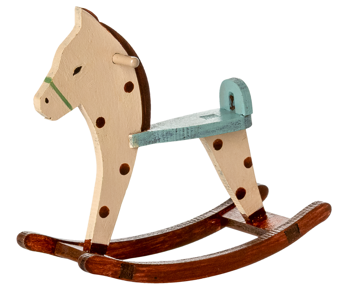 Cavalo de baloiço malhado
