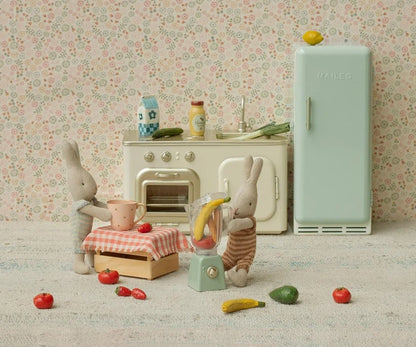 Legumes e frutas em miniatura