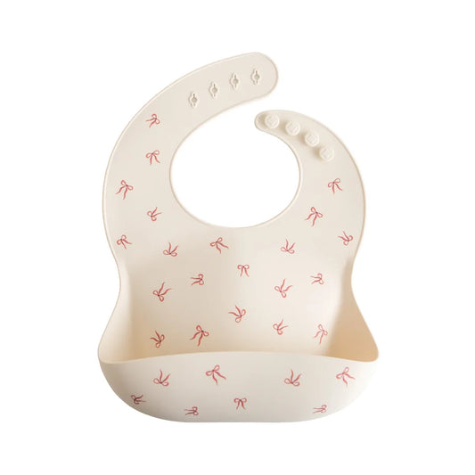 Babete silicone mushie - laços