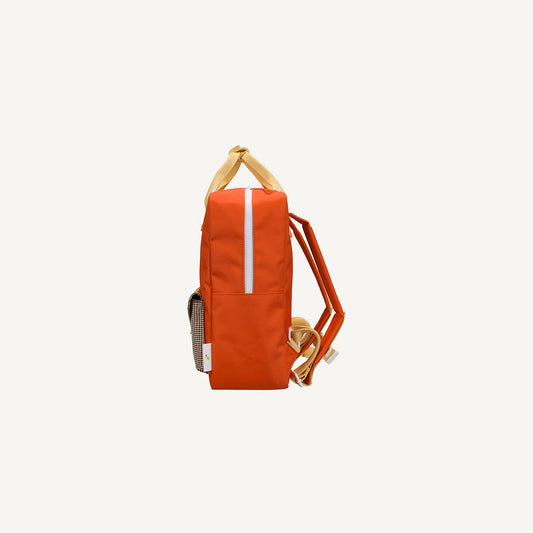 Mochila média laranja envelope castanho quadradinhos